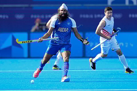 India's Jarmanpreet Singh reacts during the match against Belgium